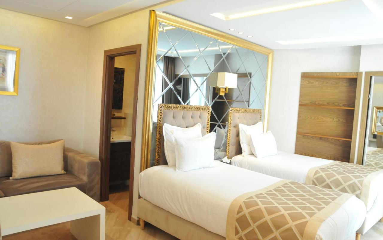 Suite Hotel Casa Diamond Casablanca Bagian luar foto A room at the hotel