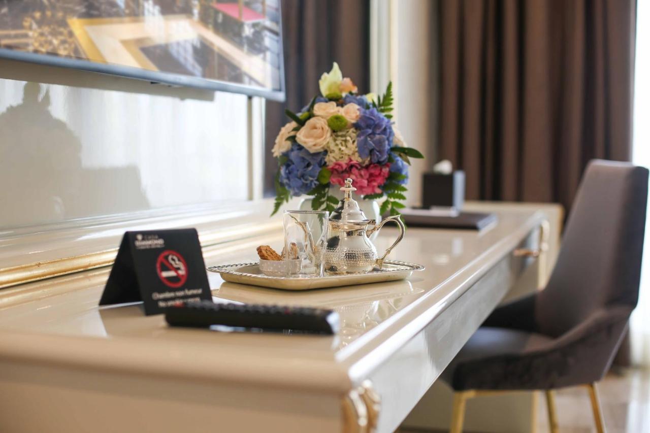 Suite Hotel Casa Diamond Casablanca Bagian luar foto A room at the hotel