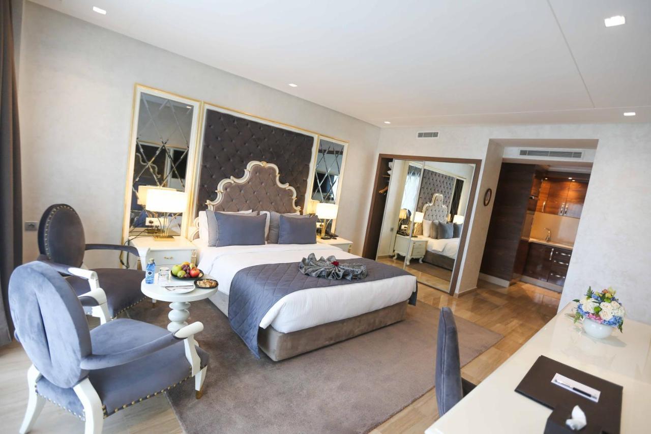 Suite Hotel Casa Diamond Casablanca Bagian luar foto A room at the hotel